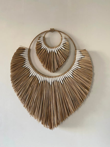 Straw and cotton wall hanging