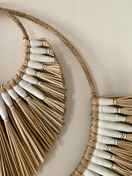 Straw and cotton wall hanging